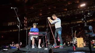 Coldplay inviting a fan to play O Fly On on stage [upl. by Sirraj]