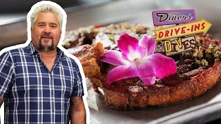 Guy Fieri Eats Chuleta KanKan Fried Pork Chop  Diners DriveIns and Dives  Food Network [upl. by Monroe]